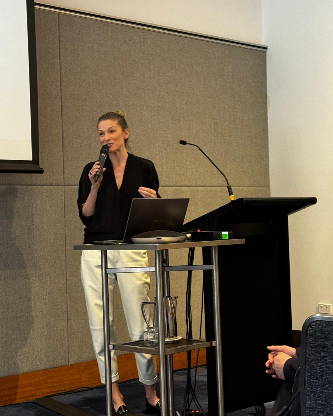 Peta Sitcheff delivering a keynote presentation at the Shoulder to Hand Alliance 2025 Hand Therapy Conference.