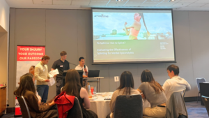Delegates attending a hand therapy conference presentation on the effectiveness of splinting for medial epicondylitis.
