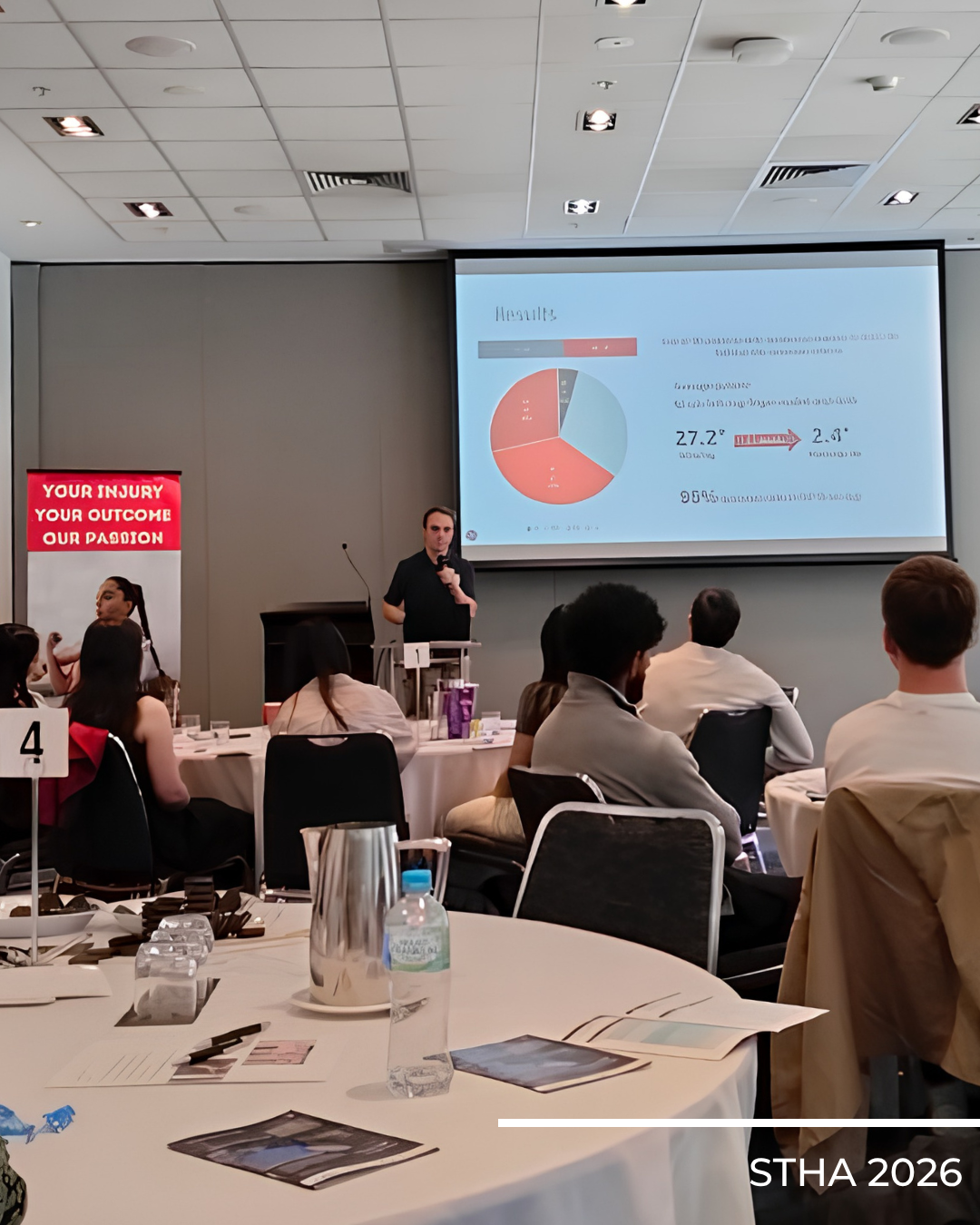 Conference delegates attending a clinical presentation featuring research findings and outcome data at the Shoulder to Hand Alliance 2026 Hand Therapy Conference.