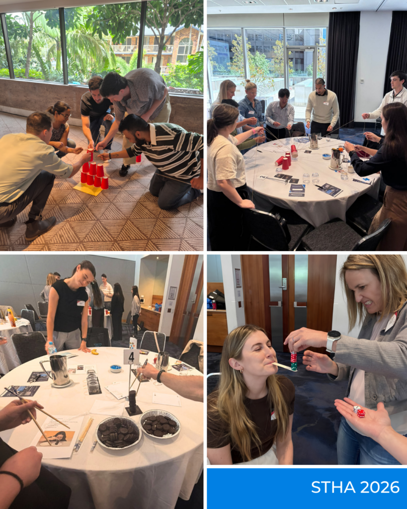 Hand therapy conference delegates participating in collaborative team-building challenges and problem-solving activities.